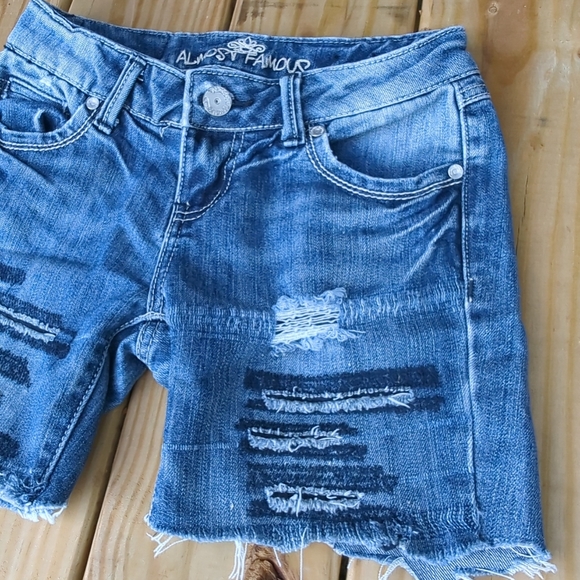 💙Almost Famous Jean Shorts with the Distressed Torn Look size 1 - Picture 5 of 12